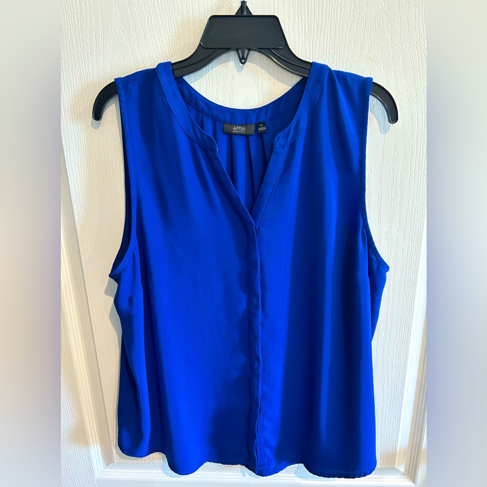Royal blue sleeveless blouse.Wear by itself or cover with an open front sweater.
